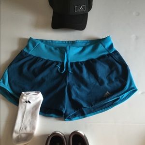 Women’s Adidas blue two tone athletic shorts.
